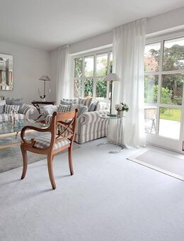 Brück Immobilien - Verträumtes Schmuckkästchen - Charmante DHH mit Südgarten - München