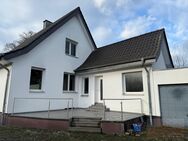 IMMOBILIEN GUMNIOR präsentiert: Einfamilienhaus mit drei Garagen in Rheine - Rheine