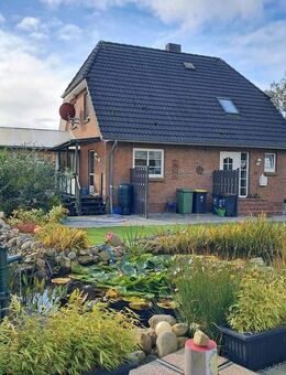 Gepflegtes Einfamilienhaus mit separatem Wohnbereich im Souterrain, Wintergarten, PV, Gartenteich - Wanderup