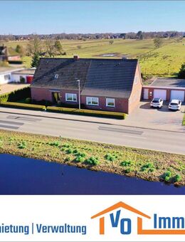 Gemütlich, großzügig und gepflegt: Wohnhaus auf Südgrundstück mit Einliegerw. sowie 1,5 ha Grünland - Großefehn