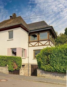 Geräumiges Einfamilienhaus mit Einliegerwohnung auf großem Grundstück! - Raubach