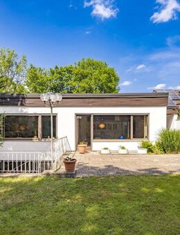 Erleben Sie Raum neu. Ein Bungalow, der sofort beeindruckt. - München
