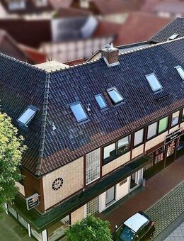 Kernsanierte Kapitalanlage mit Anbau: 6 Wohnungen und 3 Gewerbeeinheiten in Moringen - Moringen
