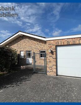 Gepflegtes Einfamilienhaus in Holzrahmenbauweise mit Doppelgarage und Terrasse in perfekter Lage - Rhauderfehn