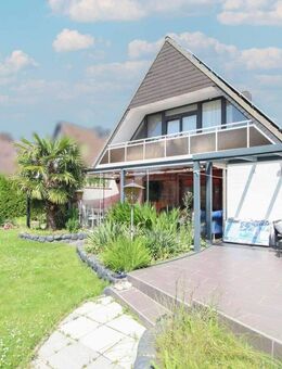 Gepflegtes Einfamilienhaus in zentraler Lage mit traumhaftem Garten, PV-Anlage und Wallbox - Lübeck