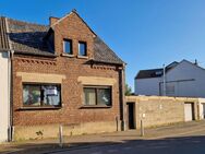 Wohnhaus mit Einliegerwohnung, Innenhof, Garten, Garage und Lagerfläche in Düren Merken - Düren