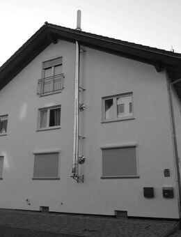 Saniertes Zweifamilienhaus in begehrter Lage mit großem Grundstück und vielseitigem Potenzial! - Glauburg