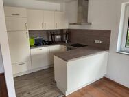 Zentrumsnahe 3-Zimmer Wohnung mit Terrasse, Tiefgarage, Außenstellplatz, Einbauküche und Keller - Eggenfelden