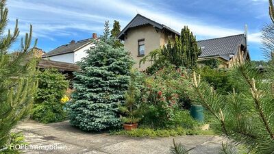 Villenartiges Einfamilienhaus mit großem Gartenanteil und Nebengebäuden in Radebeul