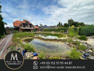 Einfamilienhaus mit großem Schwimmteich und Garten in Friedrichsfehn, optionales Baugrundstück - Edewecht