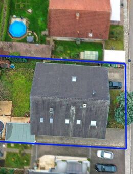 "Selber einziehen und Kapitalanlage: Vielseitiges Mehrfamilienhaus mit attraktiven Mieteinnahmen" - Sinsheim