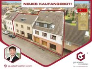 Zwei auf einen Streich! Zwei Einfamilienhäuser mit gemeinsamem Innenhof, 3 Garagen und Nebengebäude - Bornheim (Nordrhein-Westfalen)
