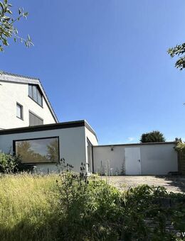 Bezaubernde Einfamilien-Doppelhaushälfte mit Doppelgarage in familienfreundlicher Lage - Karben