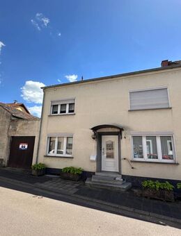 Familienhaus mit großzügigem Garten und zusätzlicher Garage - Merzig