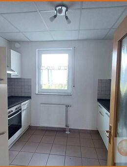 Behindertengerechte 2- Zimmerwohnung mit Balkon u. EBK in zentraler Innenstadtlage von Schlüchtern - Schlüchtern