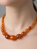 Bernsteinperlenkette aus warmen Cognac Ton in 44627