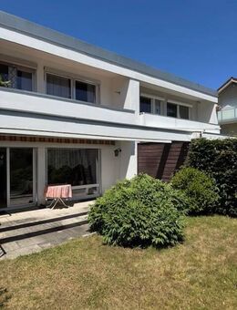 Brück Immobilien - Charmantes 5 Zi.-Reihenmittelhaus mit Süd-Terrasse und Garten - Unterhaching