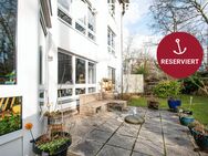 Tolle Erdgeschosswohnung mit Wintergarten, Tiefgaragenplatz, Terrassen- & Gartennutzung - Lüneburg