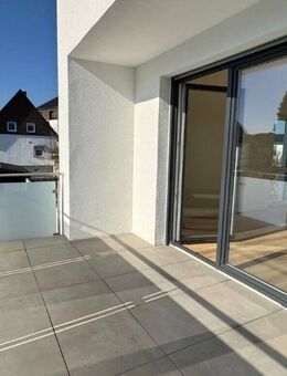 TOP Lage - 3-Zimmer, Küche, Bad, Gäste-WC, Abstellraum und Balkon in Baunatal / A+ Energieeffizienz - KFW 55 - & Erstbezug - - Baunatal