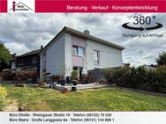 Großzügiges Architektenhaus mit Einliegerwohnung in schöner Ortsmittelage mit tollem Garten und teilweise mit schönem Weitblick - Nieder-Olm