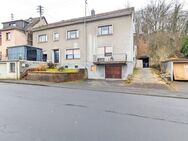 Solide Kapitalanlage: Mehrfamilienhaus mit 4 Wohneinheiten, Garagen und Garten! - Betzdorf