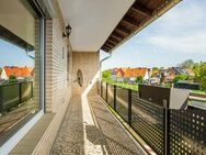 Schön geschnittene 3-Zimmer-Wohnung mit überdachter Loggia, Gartenanteil und 2 Garagen - Wolfsburg