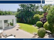 VON POLL - FRIEDRICHSDORF: Exklusive Bauhaus-Villa - Wohnen und Arbeiten mit Blick auf den Hardtwald - Friedrichsdorf