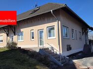 Energieeffizientes vermietetes Doppelhaus in ruhiger Lage - Moorgrund