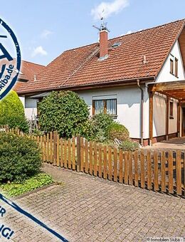 Ansprechendes Wohngebiet in Ringen: Einfamilienhaus mit Garten und Garage - Grafschaft