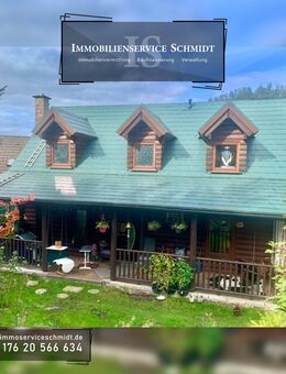 Amerikanisches Blockbohlenhaus / Holzhaus / Freistehendes Einfamilienhaus auf einem schön angelegten Grundstück in Schalksmühle (Strücken) - Schalksmühle