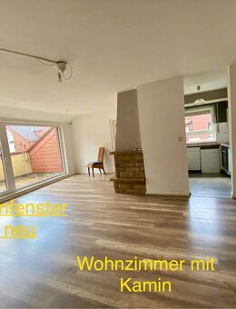 Charmante 2,5-Zimmerwohnung auf 2 Ebenen mit Kamin und Stellplatz - Niedernhausen