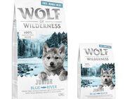 12 + 2 kg gratis! 14 kg Wolf of Wilderness Trockenfutter - Freilandhuhn mit Lachs Junior