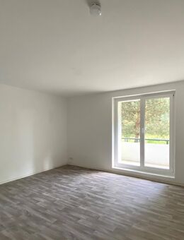 Sonnige Wohnung mit eigenem Garten, ideal geschnitten, ohne Provision - Rauen