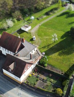 Gebäudeensemble mit drei Wohnhäusern und Bebauungsmöglichkeit - Kottweiler-Schwanden