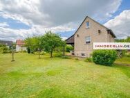 IMMOBERLIN.DE - Sympathisches Haus mit großzügigem Garten, Nebengebäude + Ausbaupotential in familiärer Lage - Hennigsdorf