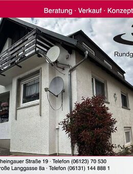 Charmantes Zweifamilienhaus mit vielseitig nutzbarem Untergeschoss und großem Innenhof - Partenheim