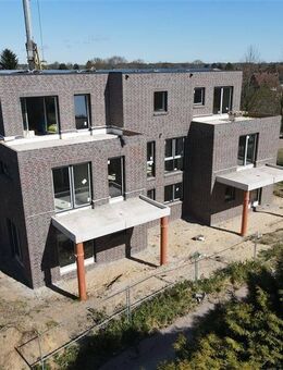 KFW Höchst attraktive Neubau-Obergeschosswohnung mit Balkon und Aufzug in gefragter Lage! - Schortens