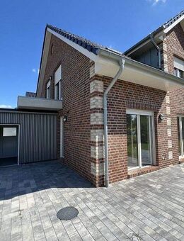 Vermietung: Erstbezug, moderne Erdgeschosswohnung mit Terrasse und Carport in Westoverledingen - Westoverledingen