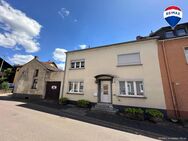 Familienhaus mit großzügigem Garten und zusätzlicher Garage - Merzig