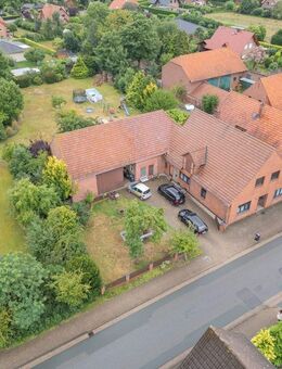 Verkauf: Ebenerdiges Wohnhaus in Uchte mit Ausbaupotenzial und einem 2.059 m² großen Grundstück! - Uchte