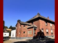 Doppelhaushälfte mit zwei Wohneinheiten und großem Garten in Übach-Palenberg, Stadtteil Marienberg - Übach-Palenberg