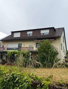 Kapitalanlage! 3-Zimmer-Eigentumswohnung mit Gartenanteil, Stellplatz und Garage in Niedernhausen - Niedernhausen
