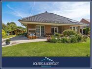 Wohlfühloase am Sackgassenende: Niedrigenergiehaus mit wunderschönem Garten, Ausbauoption und Carport - Sahms