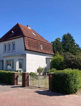 PURNHAGEN-IMMOBILIEN - Charmantes Einfamilienhaus mit Baugrundstück in zentraler Wohnlage - Bremen