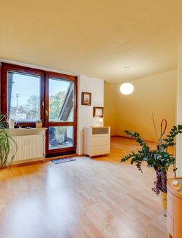 AIGNER - Charmante Dachgeschosswohnung mit durchdachtem Raumkonzept - München