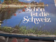 Bildband günstig zu verkaufen. 1. Schön ist die Schweiz/ 2. Guiness Buch der Rekorde - Rödermark