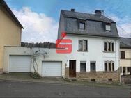 Einfamilienhaus mit zwei Garagen und Gartengrundstück - Kyllburg