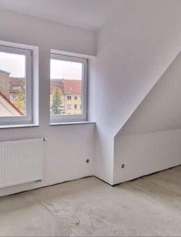 IMMOBERLIN.DE - Geräumige Dachgeschosswohnung in angenehmer Lage beim Waldpark - Hennigsdorf