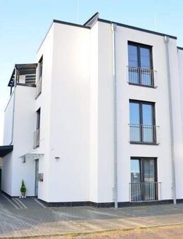 Außergewöhnliches Zweifamilienhaus mit Lift unterteilt in eine Penthouse- Wohnung über 2 Etagen sowie einer Erdgeschosswohnung in Rastede/ Zentrum - Rastede