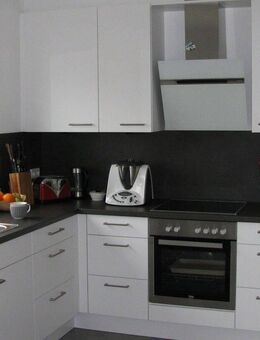 Schicke 2,5 - Zimmer-Dachgeschosswohnung mit Balkon und Küche - Vrin